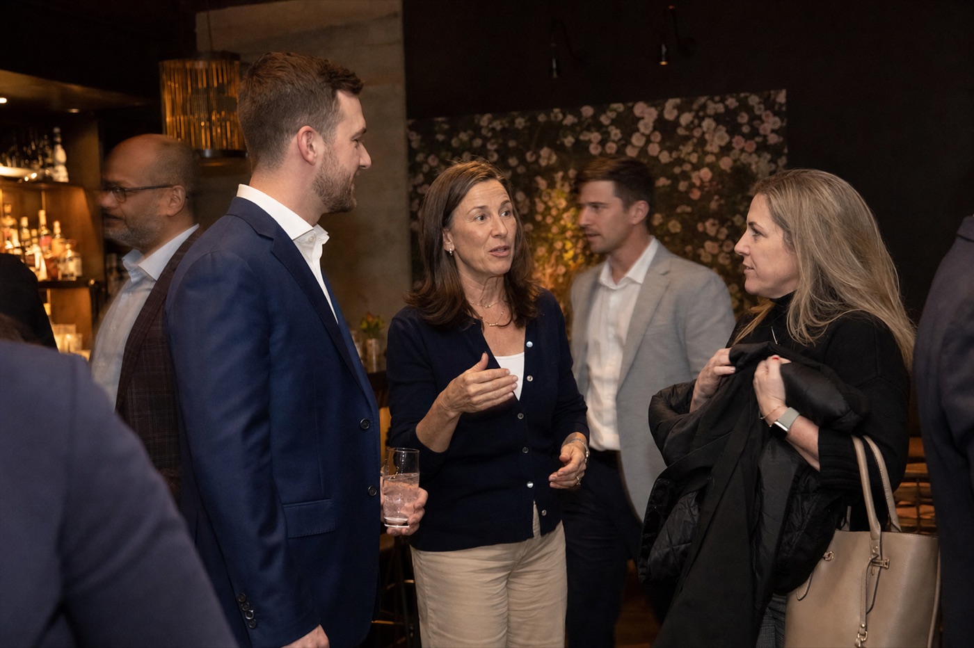 Partners and advisors in conversation at an Indi partner evening